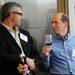 Mike Appel and Jacob Seagull chat during an appetizer hour at Dining for Dollars fundraiser for HARC at Zingerman's Roadhouse on Wednesday.  Melanie Maxwell I AnnArbor.com